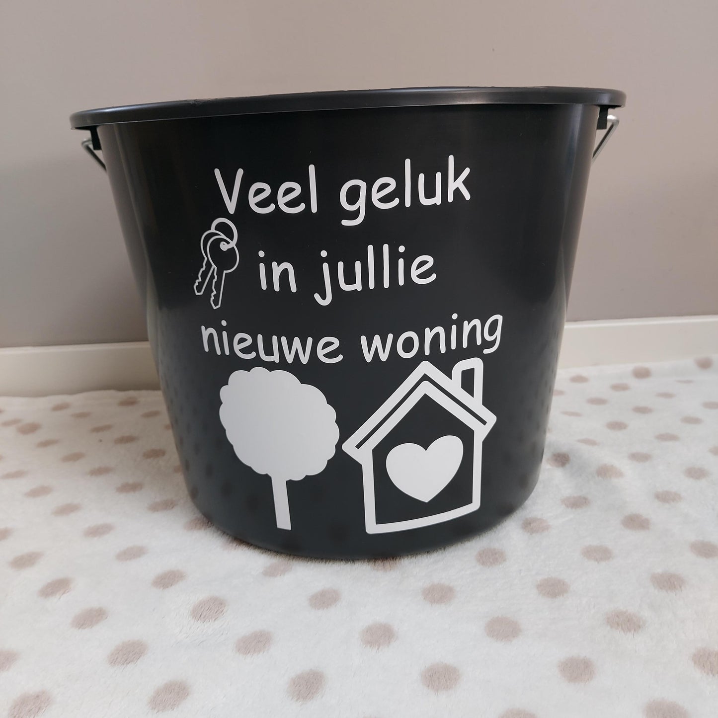 Emmer bedrukt met tekst van Het Blije Snoetje.