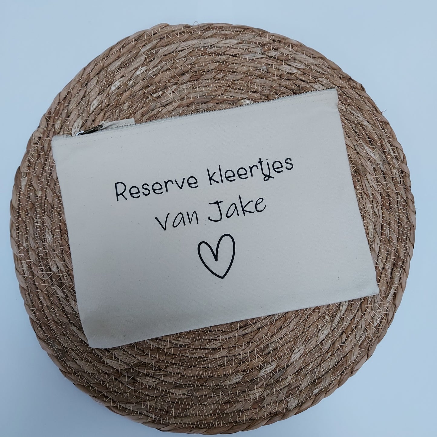 Reserve kleertjes etui gepersonaliseerd voor in de luiertas van Het Blije Snoetje.
