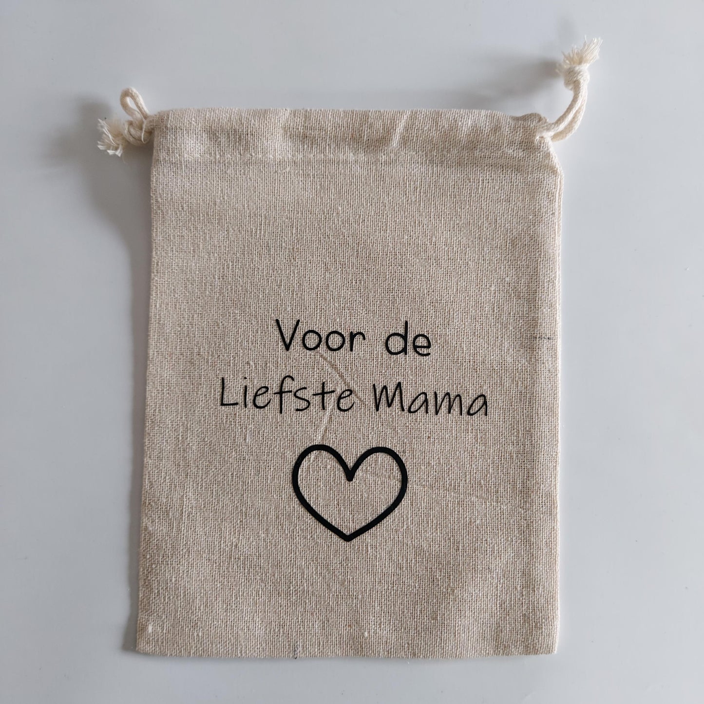 cadeauzakje voor de liefste mama van het blije snoetje.