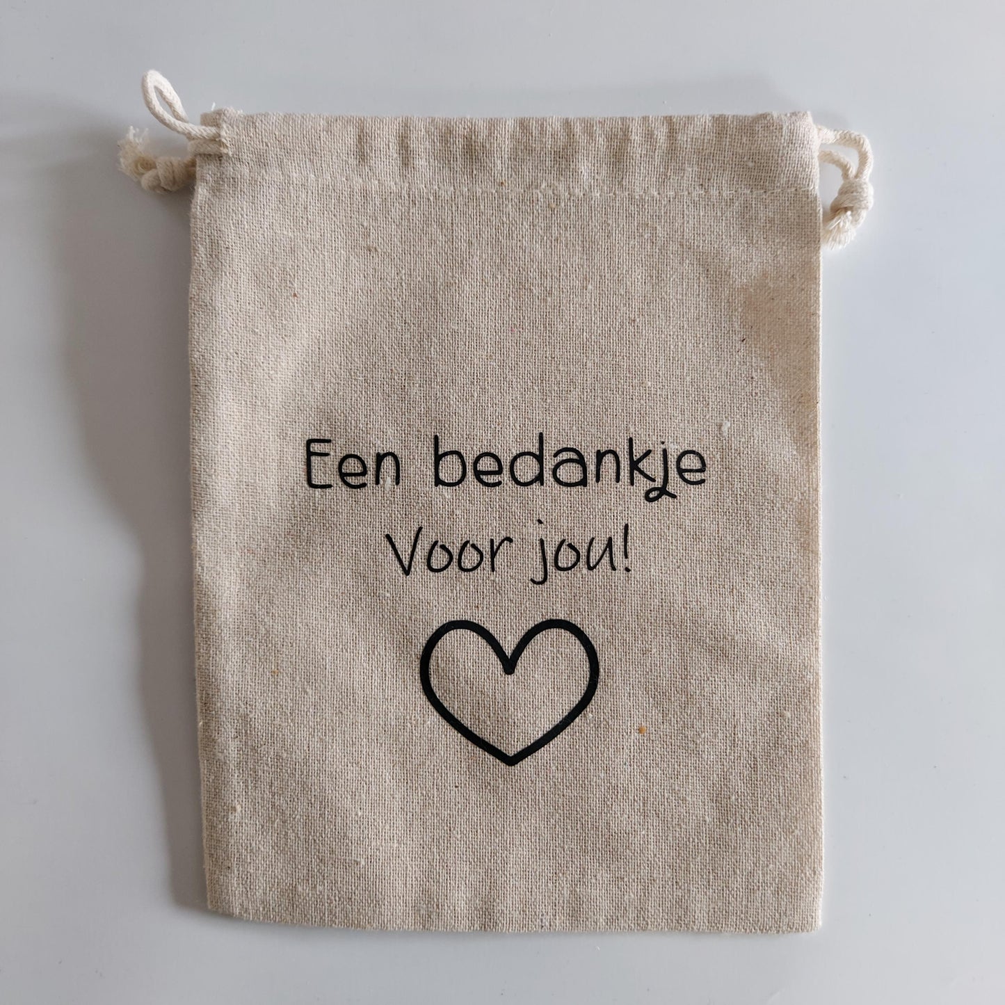 cadeauzakje een bedankje voor jou van het blije snoetje.